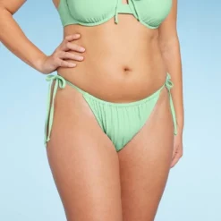 Women's Side-Tie Low-Rise High Leg Adjustable Lurex Bikini Bottom - Wild Fable™ 9 Women's Side-Tie Low-Rise High Leg Adjustable Lurex Bikini Bottom - Wild Fable™ -Wild Fable Shop GUEST 03da585c 0255 4409 8704 571a861ba24c