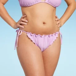Women's Ruffle Side-Tie Adjustable Coverage Bikini Bottom - Wild Fable™ 11 Women's Ruffle Side-Tie Adjustable Coverage Bikini Bottom - Wild Fable™ -Wild Fable Shop GUEST 14edd9f2 a491 4484 be9f e6a51628348d