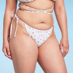 Women's Floral Print Side-Tie Ultra High Leg Adjustable Coverage Bikini Bottom - Wild Fable™ White 11 Women's Floral Print Side-Tie Ultra High Leg Adjustable Coverage Bikini Bottom - Wild Fable™ White -Wild Fable Shop GUEST a76abeab 66b2 4843 943b d7f414064e80