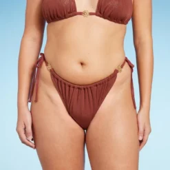 Women's Side-Tie Adjustable Extra High Leg Lurex Plisse Textured Bikini Bottom - Wild Fable™ 12 Women's Side-Tie Adjustable Extra High Leg Lurex Plisse Textured Bikini Bottom - Wild Fable™ -Wild Fable Shop GUEST cee21781 20fd 450e 8ef1 9194ba52deb3